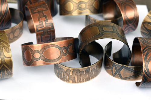 Brass and Copper Cuff Bracelets with roll printed impressions